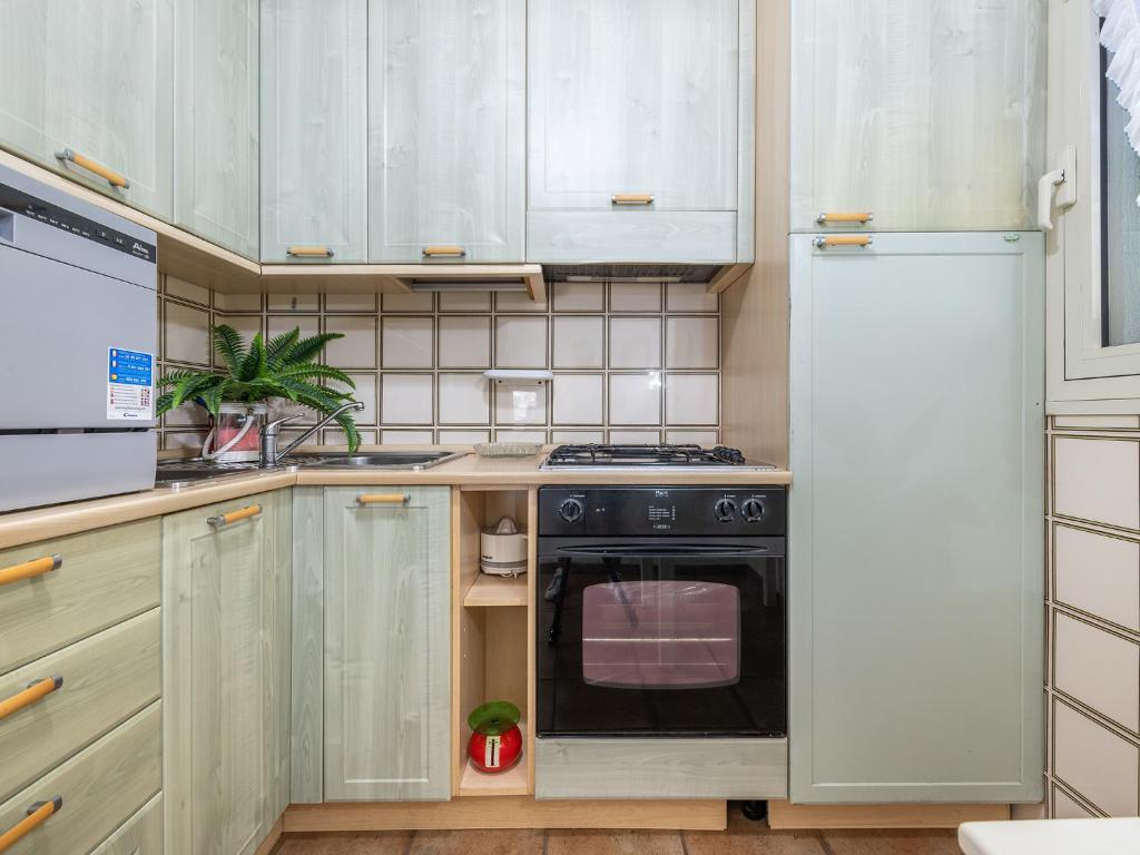 A kitchen or kitchenette at Casa Flamingo 150m dal mare