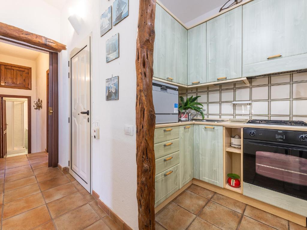 A kitchen or kitchenette at Casa Flamingo 150m dal mare