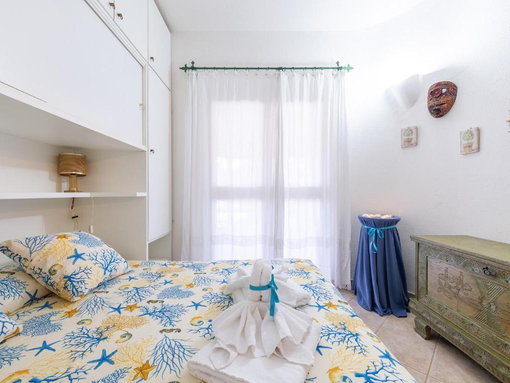 A bed or beds in a room at Casa Flamingo 150m dal mare