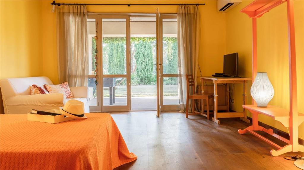 Posteľ alebo postele v izbe v ubytovaní CASA DEL VENTO 10, Emma Villas