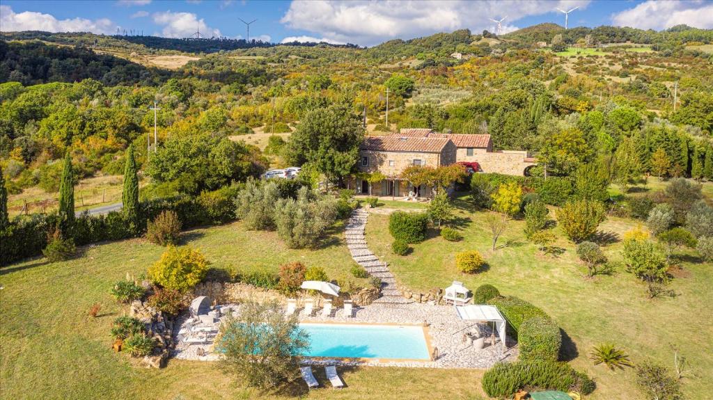 an aerial view of an estate with a swimming pool at Cinque Cipressi 8, Emma Villas in Montecatini Val di Cecina