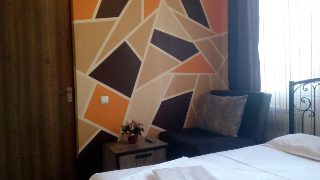 Postel nebo postele na pokoji v ubytování Hotel Isani