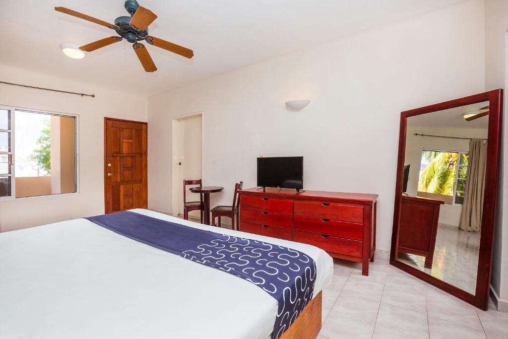 Postel nebo postele na pokoji v ubytování Hotel Kiin Cozumel