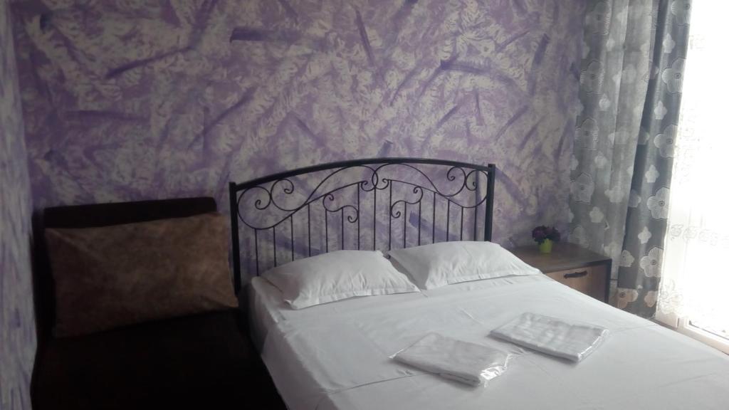 Postel nebo postele na pokoji v ubytování Hotel Isani