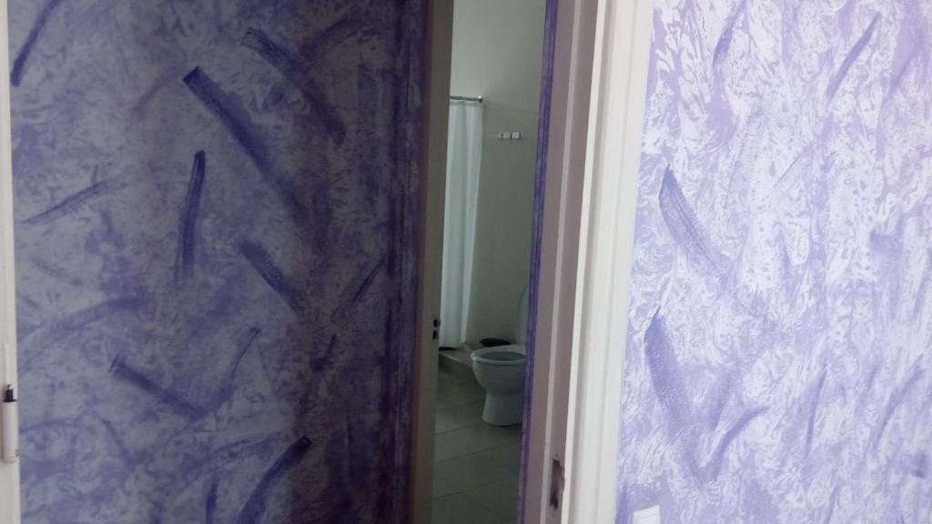 Koupelna v ubytování Hotel Isani