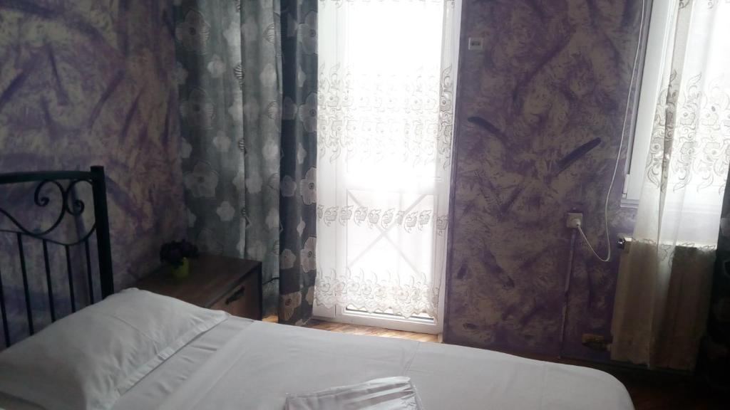 Postel nebo postele na pokoji v ubytování Hotel Isani