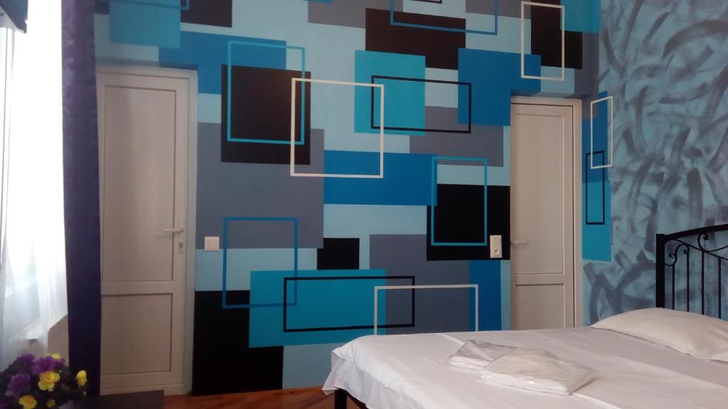 Postel nebo postele na pokoji v ubytování Hotel Isani