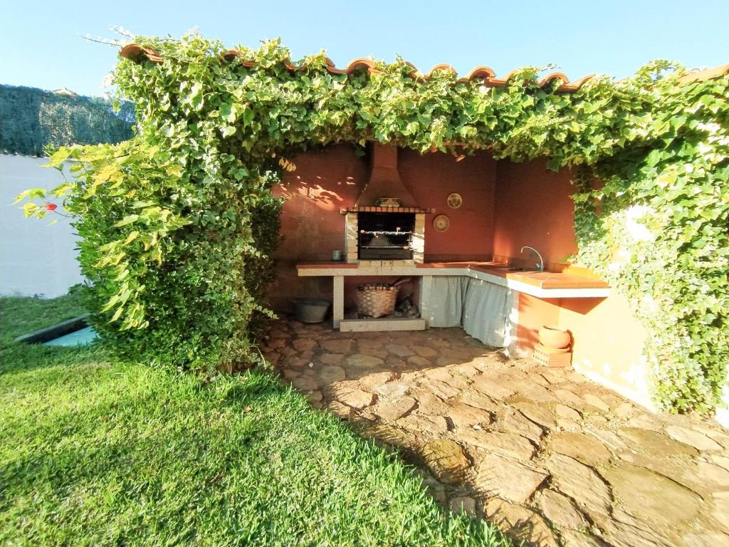 Zahrada ubytování Casa da Glicia, una casa con piscina privada, para disfrutar y relajarse