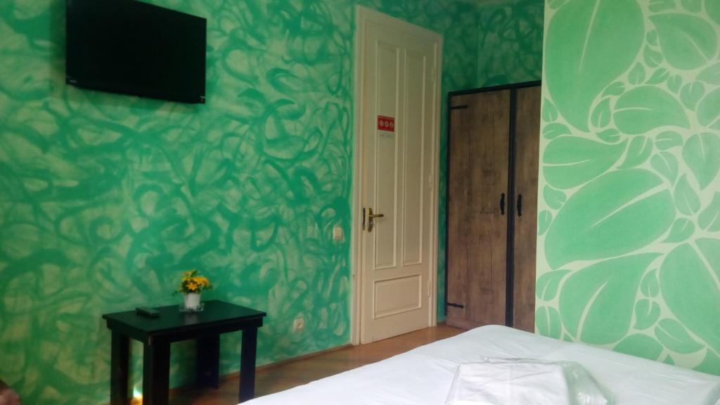 Postel nebo postele na pokoji v ubytování Hotel Isani