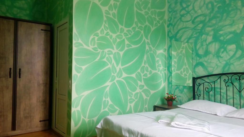Postel nebo postele na pokoji v ubytování Hotel Isani