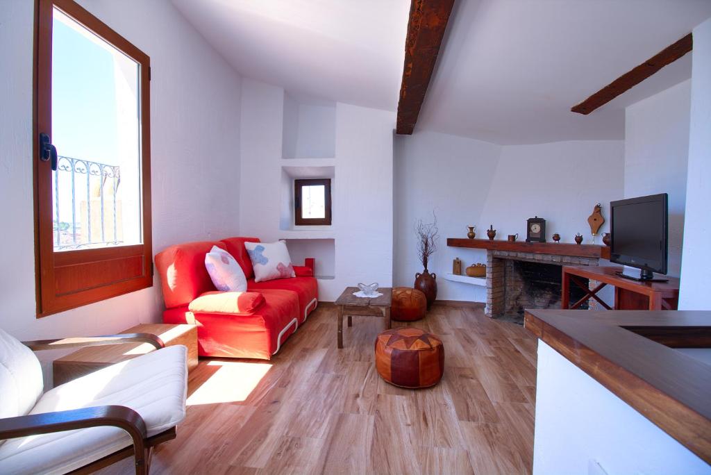 A television and/or entertainment centre at Cuencaloft Alfonso VIII