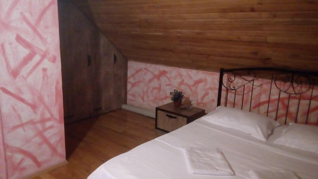 Postel nebo postele na pokoji v ubytování Hotel Isani