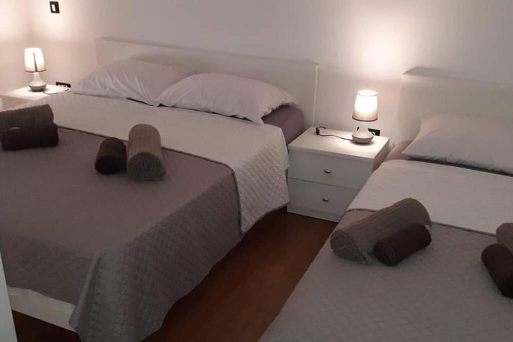 Postel nebo postele na pokoji v ubytování Apartman Franko - uz parking