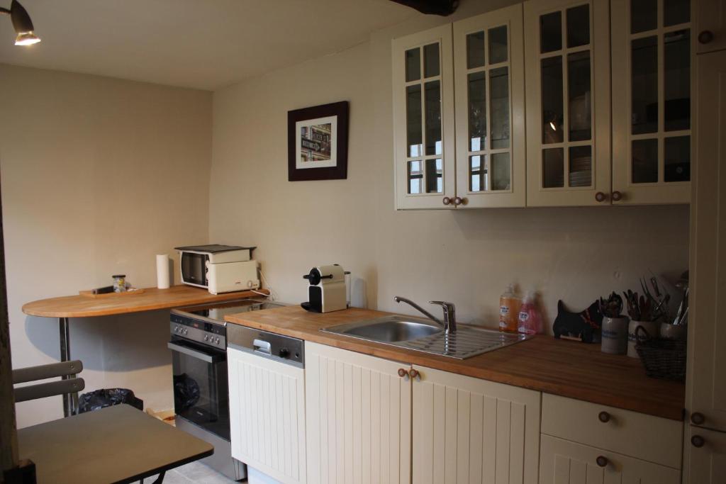 Kuchyň nebo kuchyňský kout v ubytování Auberge du Val d'Aisne