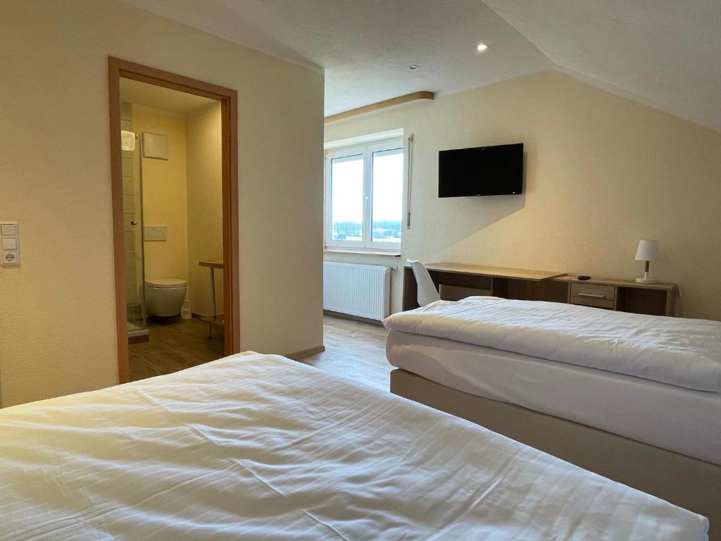 Postel nebo postele na pokoji v ubytování Hotel Andrea