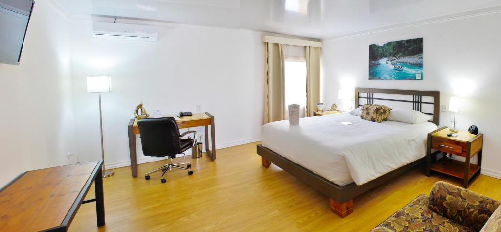 Postel nebo postele na pokoji v ubytování Hotel Zima