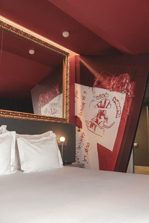 Postel nebo postele na pokoji v ubytování Burgus Tribute & Design Hotel