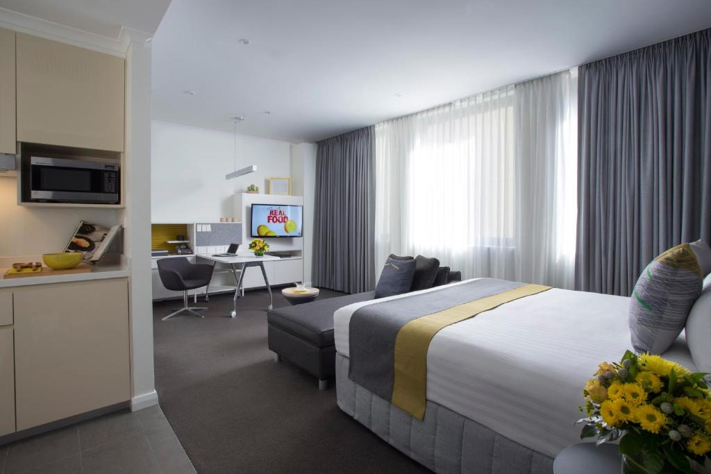 TV a/nebo společenská místnost v ubytování Citadines St Georges Terrace Perth