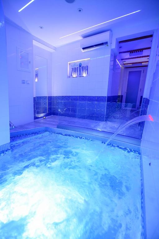 a large swimming pool in a bathroom at Villa Zafyra in Kissamos