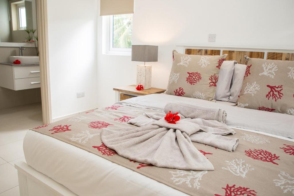 Postel nebo postele na pokoji v ubytování Villas Coco Beach Praslin