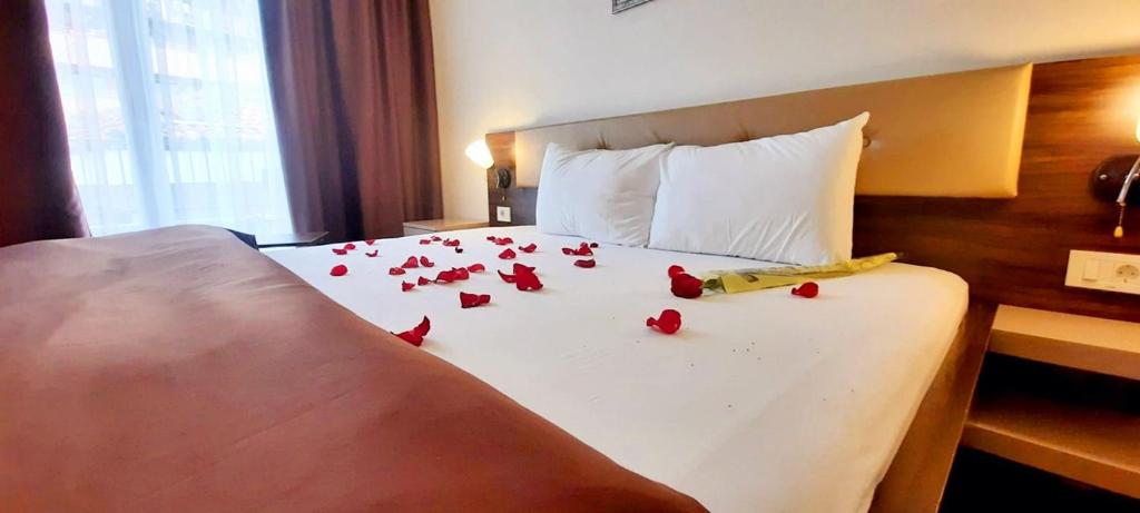 Postel nebo postele na pokoji v ubytování Hotel DOA