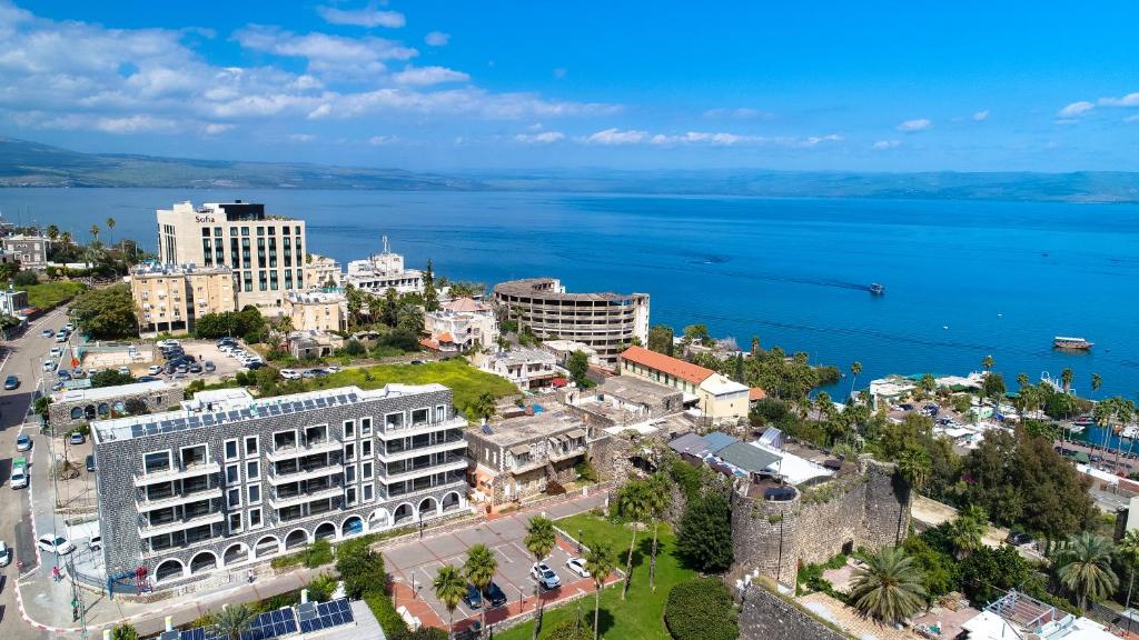 an aerial view of a city and the ocean at Europa Residence in Tiberias