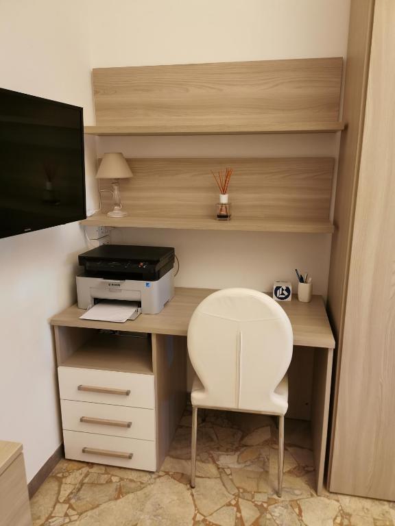 A television and/or entertainment centre at Appartamento Miramare
