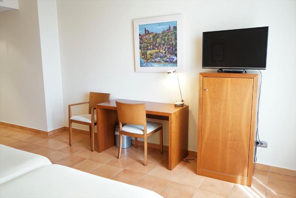 TV a/nebo společenská místnost v ubytování Hotel Santuari Balaguer
