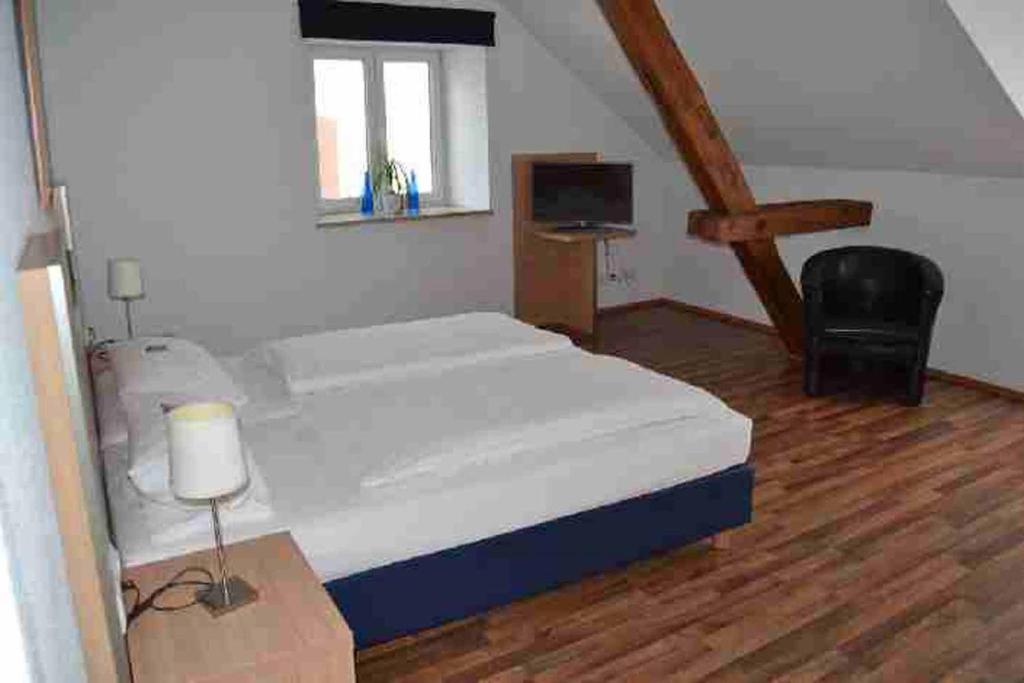 Postel nebo postele na pokoji v ubytování Hotel Sammeth Bräu