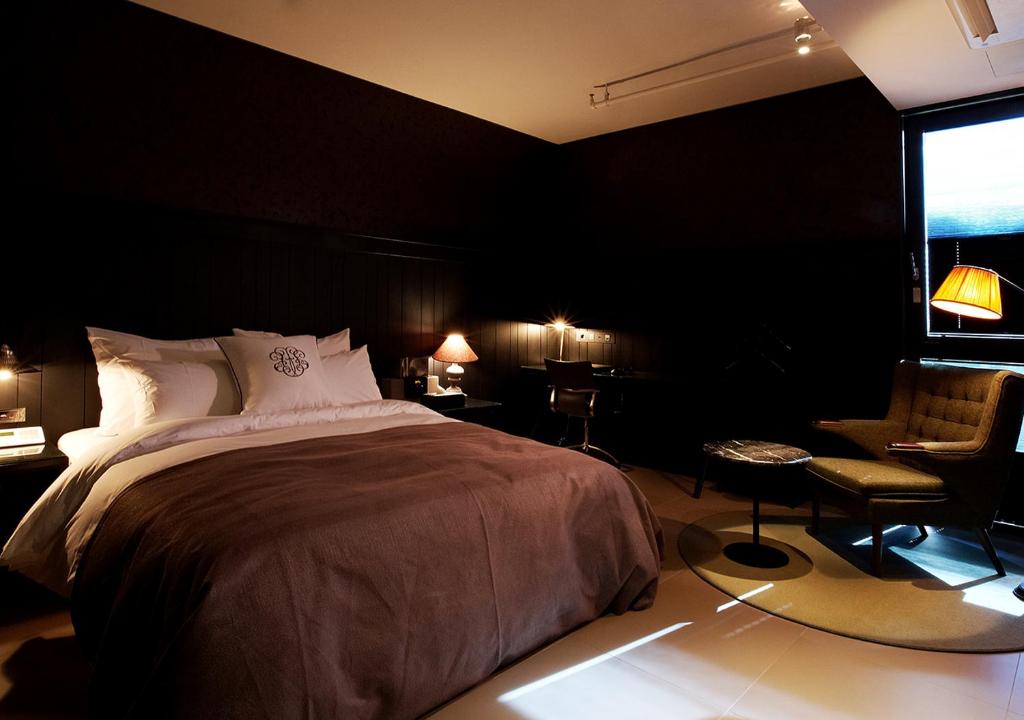 Postel nebo postele na pokoji v ubytování Lee Design Hotel