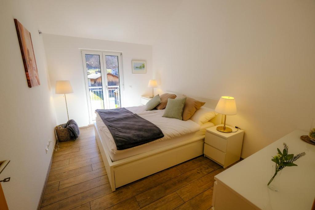 Postel nebo postele na pokoji v ubytování Modern and cosy 5 rooms penthouse with stunning view