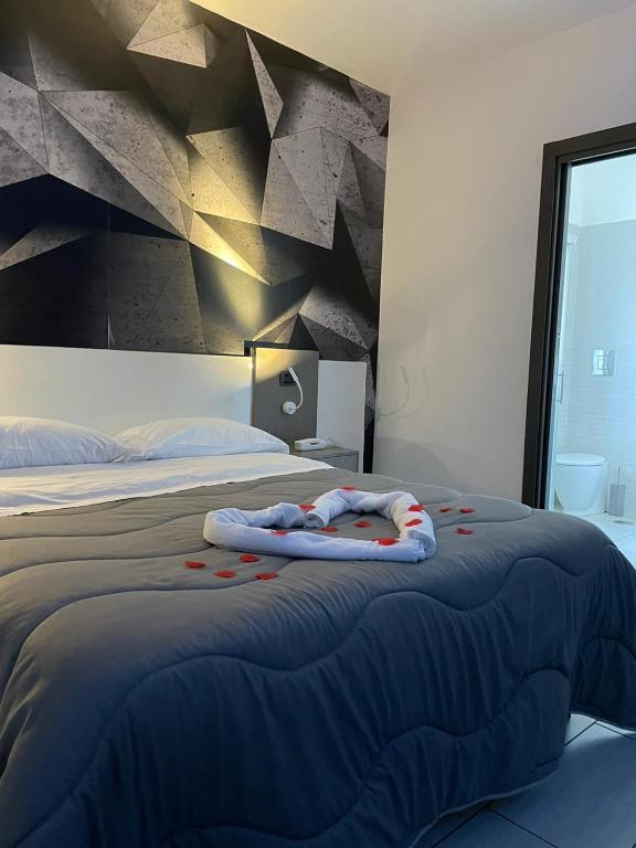 Posteľ alebo postele v izbe v ubytovaní Hotel Cristian