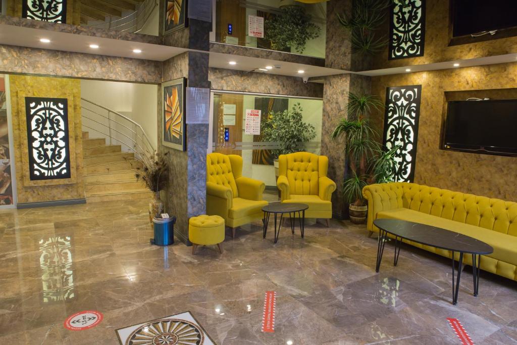 A seating area at ERDEM HOTEL