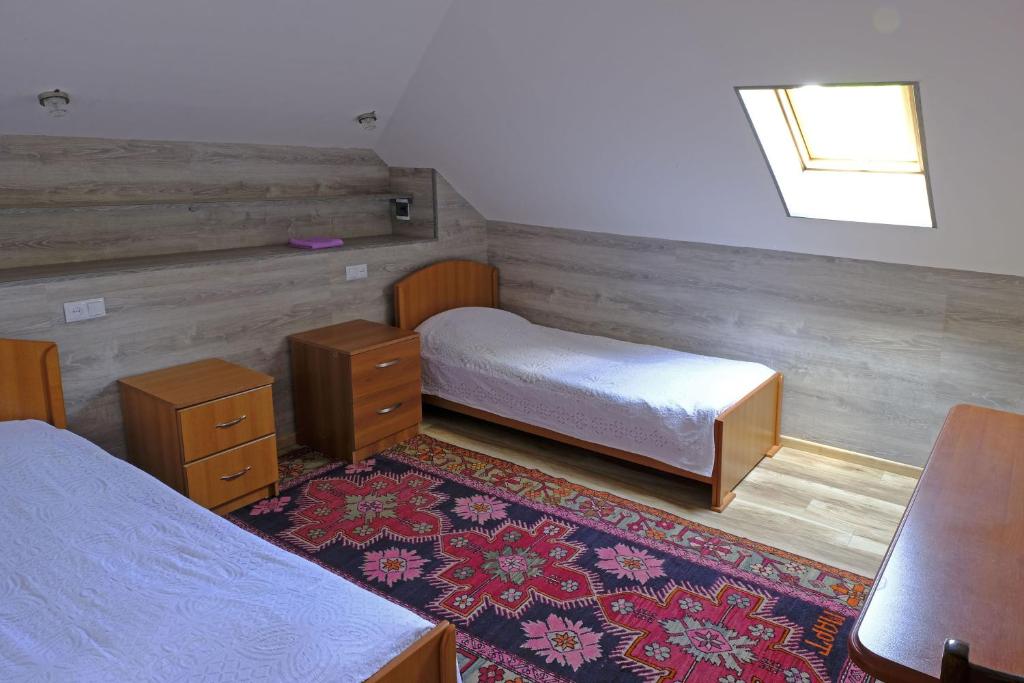 Uma cama ou camas num quarto em Chez Yvette Superbe Appartement-Terrasse à Garni