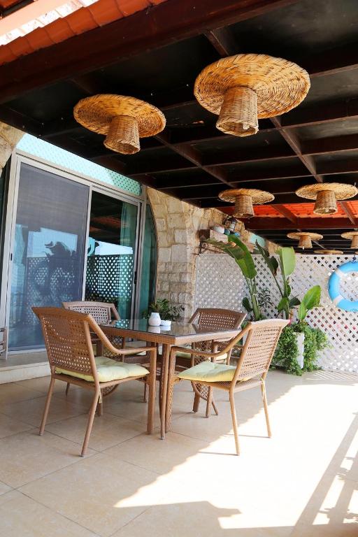 Patio nebo venkovní prostory v ubytování Le Blanc Bleu