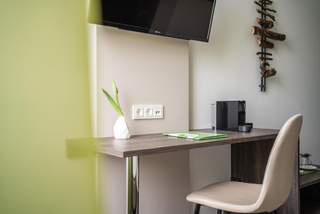TV a/nebo společenská místnost v ubytování eee Hotel Graz