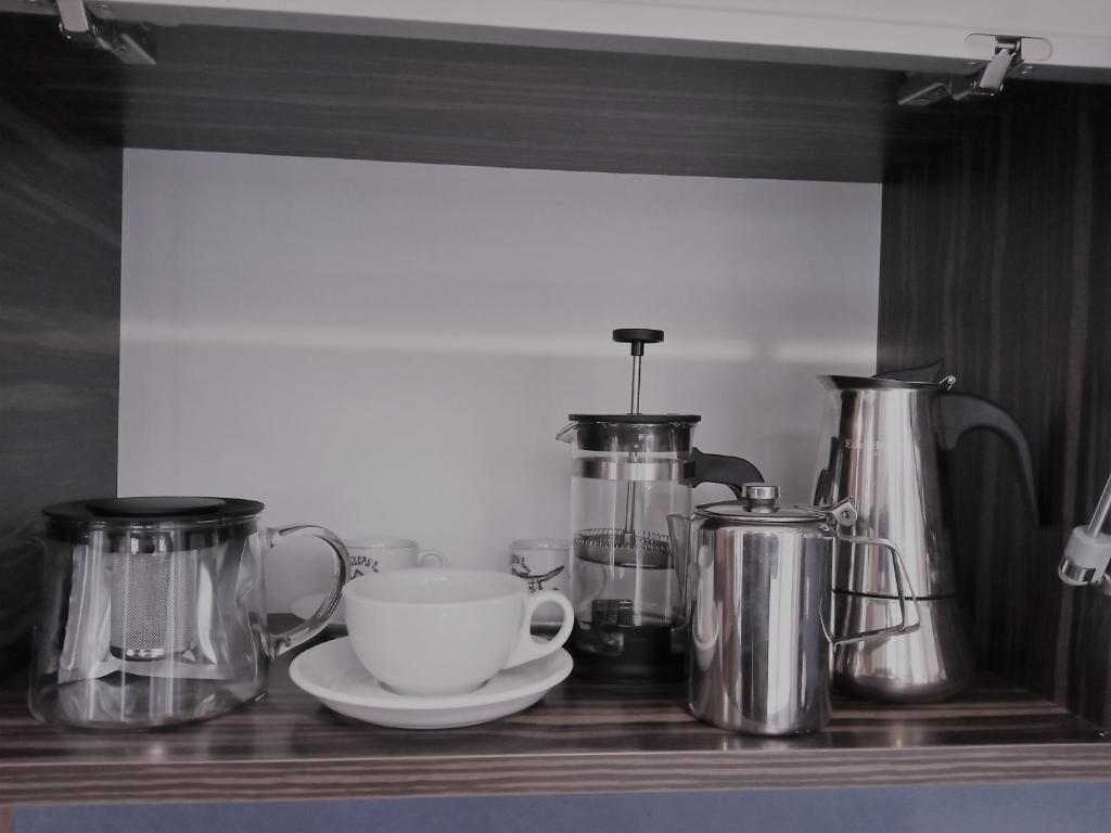 Príslušenstvo na prípravu kávy alebo čaju v ubytovaní Apartament Jonek