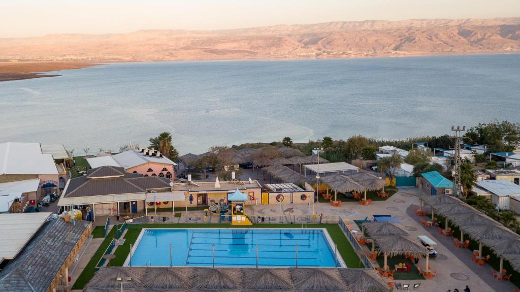 an aerial view of a resort with a swimming pool at Biankini Village Resort in Kalia