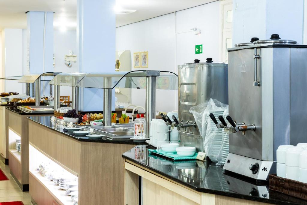 Kuchyň nebo kuchyňský kout v ubytování Hotel Baviera Iguassu