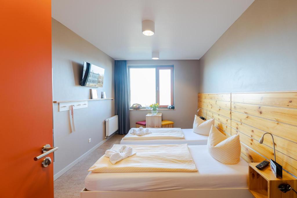 Postel nebo postele na pokoji v ubytování Haus 54