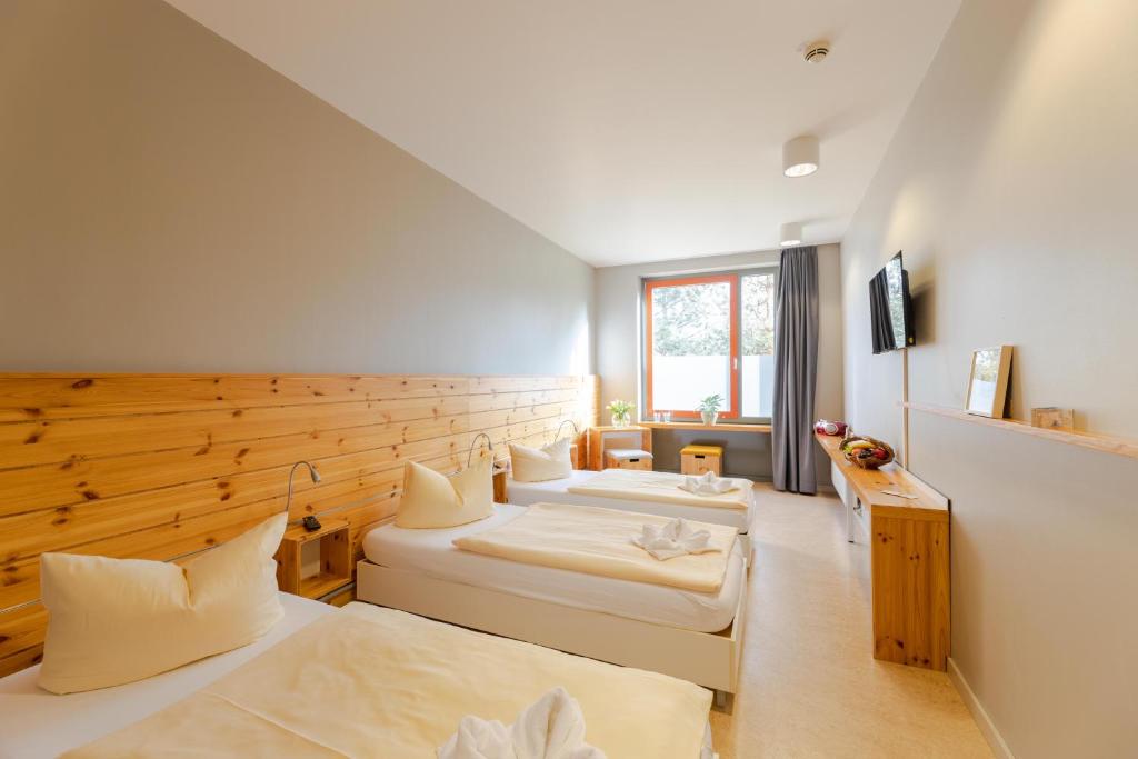 Postel nebo postele na pokoji v ubytování Haus 54