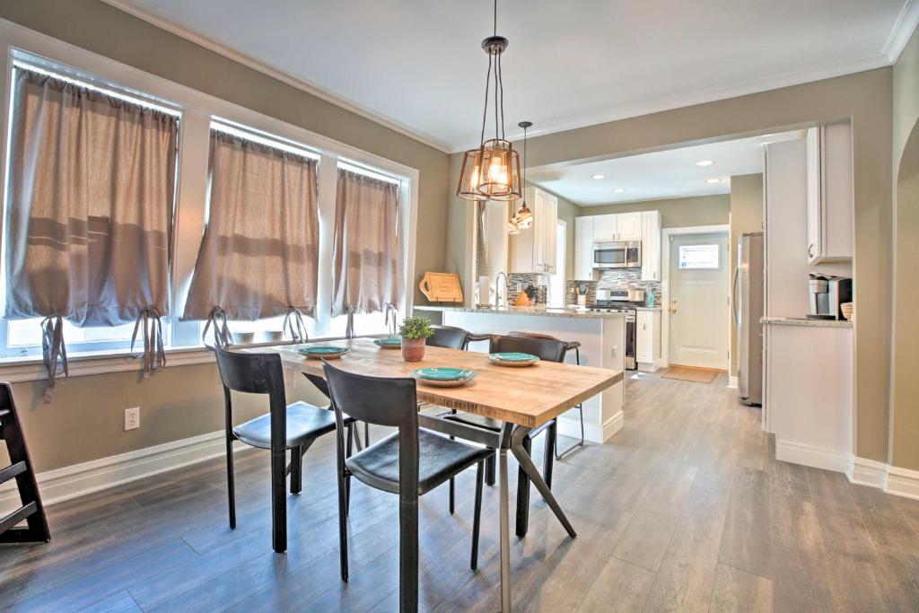 a dining room and kitchen with a table and chairs at Chicago Family Apartment - Kids and Pets Welcome! in Evanston