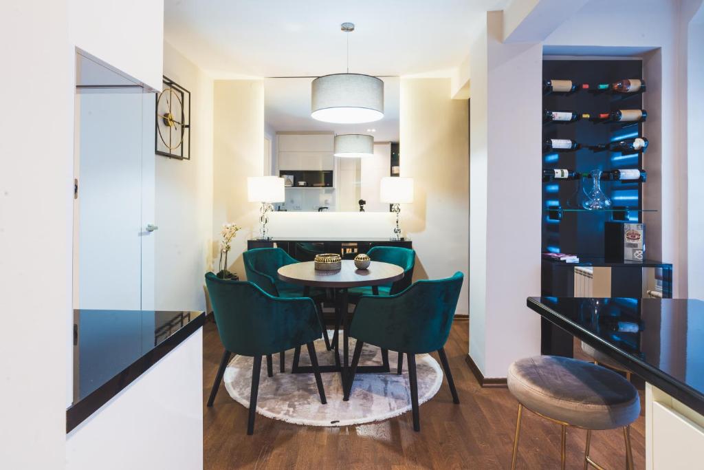 Kuchyň nebo kuchyňský kout v ubytování Majestic Apartment