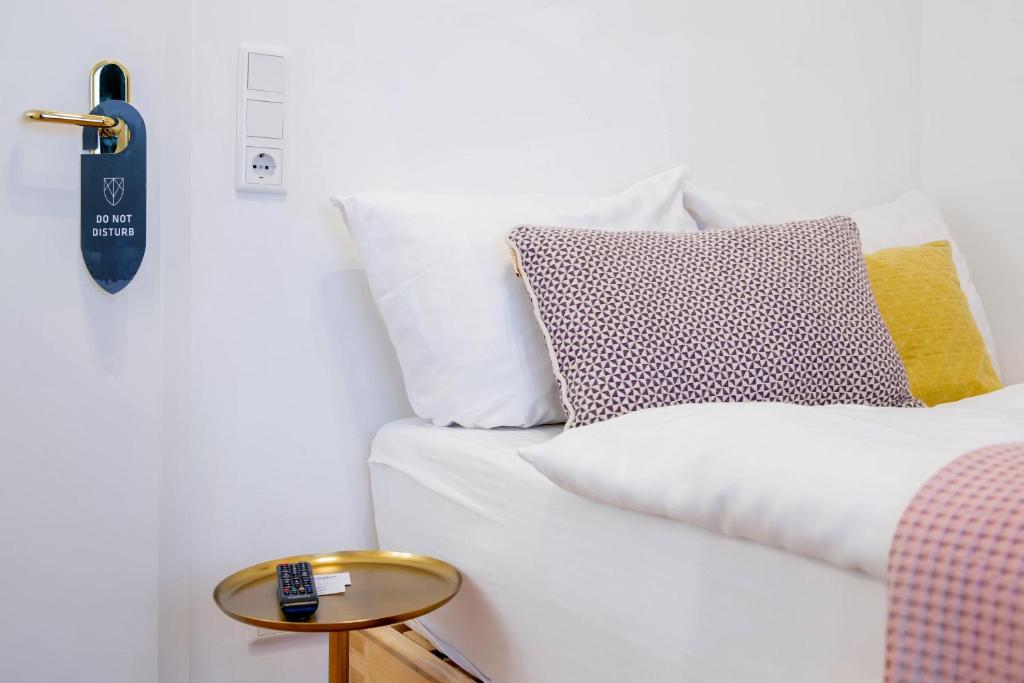 Postel nebo postele na pokoji v ubytování Victoria Hotel