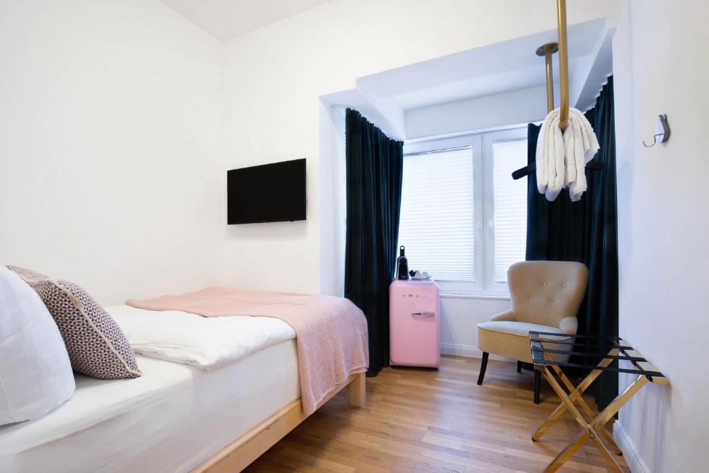 Postel nebo postele na pokoji v ubytování Victoria Hotel
