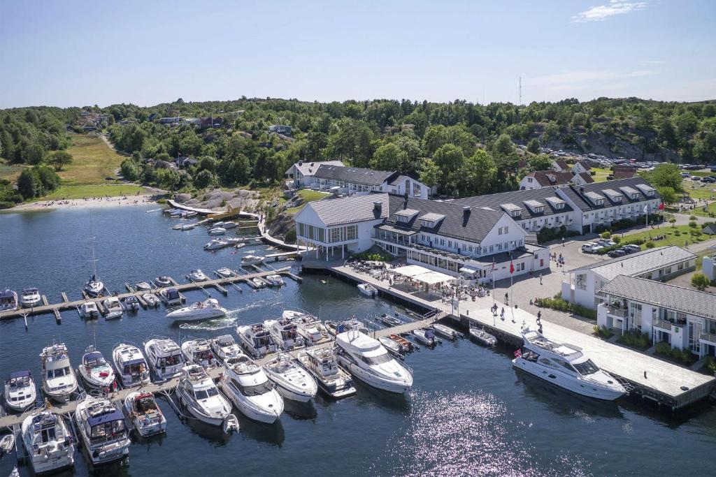an aerial view of a marina with boats in the water at Havna Hotel & Sjøbad in Tjøme