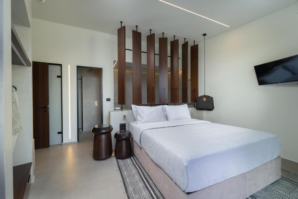 Posteľ alebo postele v izbe v ubytovaní THE WAVE GRANDE VILLA KATHISMA Lefkada