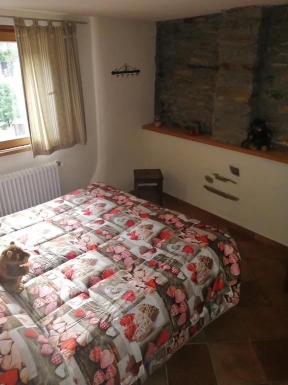 Posteľ alebo postele v izbe v ubytovaní Affittacamere I Picchi