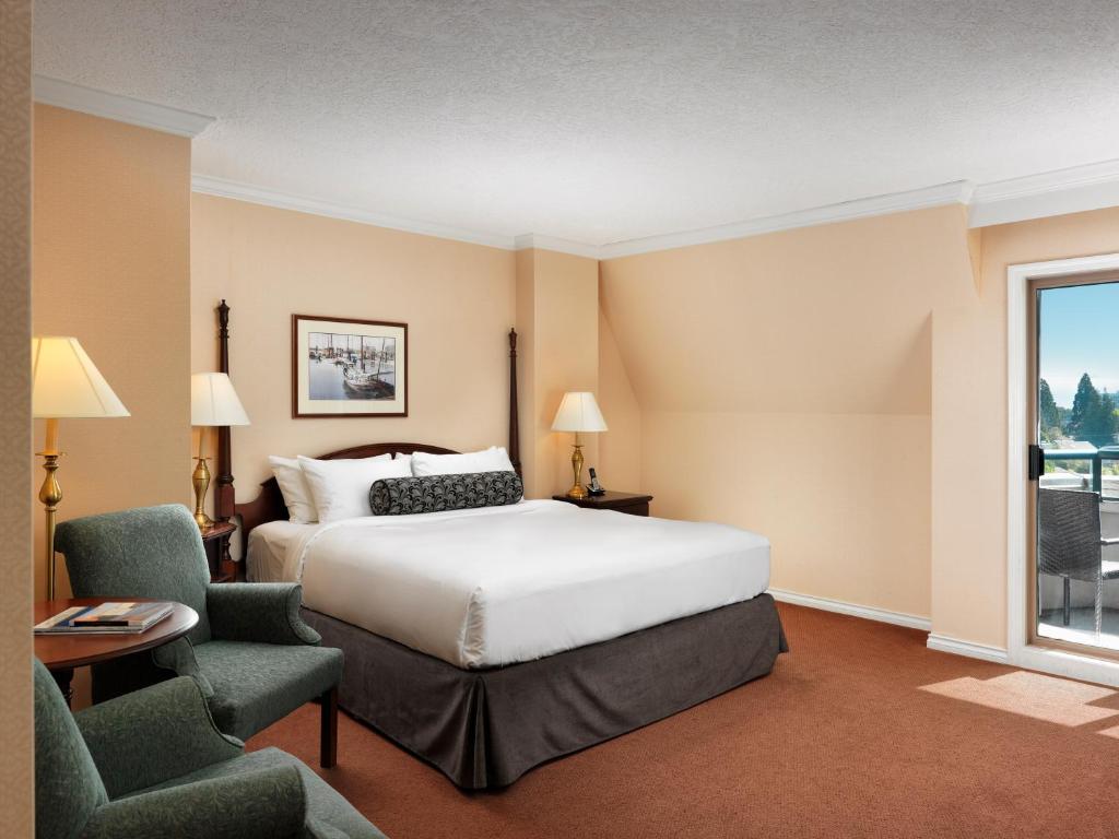 Postel nebo postele na pokoji v ubytování Hotel Grand Pacific