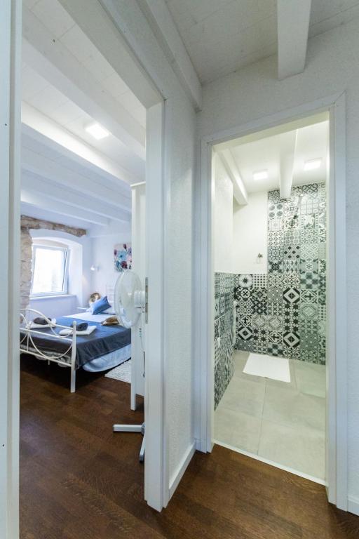 Posteľ alebo postele v izbe v ubytovaní Casa Karina